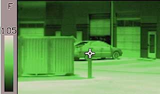 Green thermal image of a parking lot taken with the infrared camera