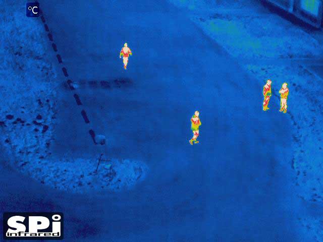 Full color Infrared UAV drone image of people in an empty parking lot