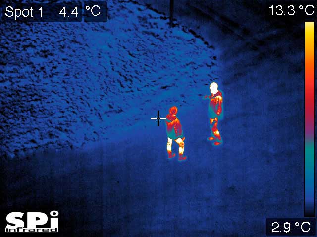 Infrared image of people in white hot, color