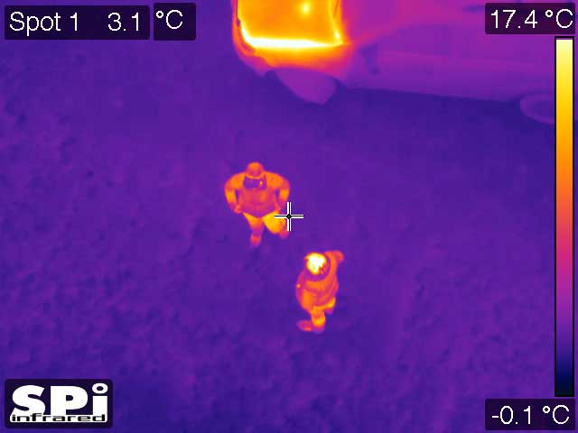 M1D UAV thermal image of people in a parking lot in color
